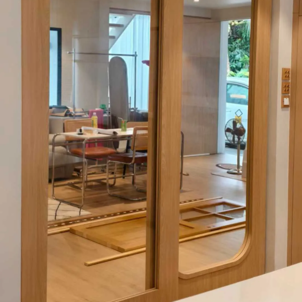 Modern custom wood sliding door with full-length mirror